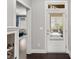 Bright entryway featuring a doorway to the patio and dark floors, offering easy outdoor access at 914 Martin Nw St, Atlanta, GA 30315