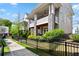 Charming townhome exterior with covered porch, stone accents, and manicured front yard at 914 Martin Nw St, Atlanta, GA 30315