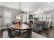Open-concept living and dining area featuring hardwood floors, fireplace, and lots of natural light at 914 Martin Nw St, Atlanta, GA 30315