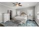 This main bedroom has neutral colors, a decorative rug, and bright, natural light at 914 Martin Nw St, Atlanta, GA 30315