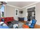 Inviting patio with comfortable seating, ceiling fan, and stylish décor, offering an ideal space for outdoor living at 914 Martin Nw St, Atlanta, GA 30315