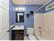 Bathroom featuring a vanity sink, mirror, and combination shower and bathtub at 916 Forest Pointe Way, Jonesboro, GA 30238
