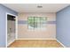 Bedroom featuring a bathroom and a large window for natural lighting at 916 Forest Pointe Way, Jonesboro, GA 30238