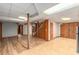Spacious basement area with wood-look flooring and access to other rooms at 3431 Alcan Way, Tucker, GA 30084