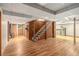 Large basement featuring wood-paneled walls and a staircase to the upper level at 3431 Alcan Way, Tucker, GA 30084