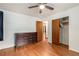 Cozy bedroom features hardwood floors, ceiling fan, and ample closet space at 3431 Alcan Way, Tucker, GA 30084