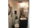 Efficient half bath including vanity and mirror at 3503 Ten Oaks Court Ct, Powder Springs, GA 30127
