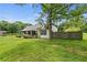 Charming home with a cozy front porch surrounded by greenery at 3517 Plunkett Rd, Stonecrest, GA 30038