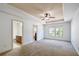 Spacious primary bedroom with ensuite bathroom, trey ceiling, and lots of natural light at 1071 N Village Dr, Decatur, GA 30032