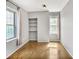 Bedroom with hardwood floors and natural light streaming through the windows at 199 14Th Ne St # 402, Atlanta, GA 30309