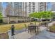 Serene courtyard with manicured landscaping and comfortable seating areas for residents at 199 14Th Ne St # 402, Atlanta, GA 30309