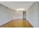 Open living room featuring hardwood flooring and ample space at 199 14Th Ne St # 402, Atlanta, GA 30309