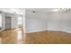 Spacious living room featuring hardwood floors and contemporary lighting at 199 14Th Ne St # 402, Atlanta, GA 30309