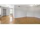 Spacious living room with hardwood floors, ample natural light, and neutral paint at 199 14Th Ne St # 402, Atlanta, GA 30309
