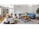 Bright living room featuring hardwood floors, neutral walls, and modern furnishings at 199 14Th Ne St # 402, Atlanta, GA 30309
