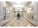 Elegant lobby with marble floors, recessed lighting, and decorative accents create a grand entrance at 199 14Th Ne St # 402, Atlanta, GA 30309