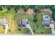 Aerial view showcases lush landscaping and outdoor amenities, including a playground and pool at 265 Enfield Ln, Mcdonough, GA 30252