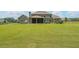 An enormous backyard with lush green lawn and partially fenced area, perfect for entertainment at 265 Enfield Ln, Mcdonough, GA 30252