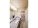 Bright bathroom with tile flooring, a shower-tub combo, and granite countertops at 265 Enfield Ln, Mcdonough, GA 30252