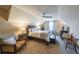 Comfortable bedroom featuring ceiling fan, carpet, and ample natural light at 265 Enfield Ln, Mcdonough, GA 30252