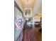 Grand foyer with high ceilings, hardwood floors, and elegant staircase at 265 Enfield Ln, Mcdonough, GA 30252