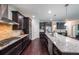 Well-equipped kitchen with stainless steel appliances, granite countertops, and custom cabinets at 265 Enfield Ln, Mcdonough, GA 30252