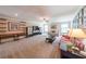Large living room with ample seating and built-in storage at 265 Enfield Ln, Mcdonough, GA 30252