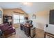 Cozy office with dark wood furnishings, natural light, and unique decor at 265 Enfield Ln, Mcdonough, GA 30252