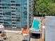 This aerial view highlights the condo building, its amenities and its surrounding area at 3338 Peachtree Ne Rd # 508, Atlanta, GA 30326