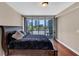 Bedroom with a view from the balcony offering glimpses of the city skyline at 3338 Peachtree Ne Rd # 508, Atlanta, GA 30326