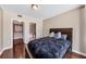 Bedroom with wood floors located near a walk-in closet and ensuite bathroom at 3338 Peachtree Ne Rd # 508, Atlanta, GA 30326