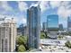 Stunning view of a modern high-rise building with curved architecture and glass facade at 3338 Peachtree Ne Rd # 508, Atlanta, GA 30326