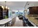 Open-concept living area with hardwood floors, a dining space, and a view of the city at 3338 Peachtree Ne Rd # 508, Atlanta, GA 30326
