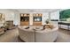 A comfortable lounge area with custom built-in shelving, media center, and stylish, curved seating at 3338 Peachtree Ne Rd # 508, Atlanta, GA 30326