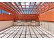Outdoor kitchen with built-in grills and stylish pergola, creating an ideal space for outdoor cooking and entertaining at 3338 Peachtree Ne Rd # 508, Atlanta, GA 30326