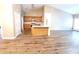 Bright kitchen with an island bar and stainless steel appliances at 3878 Hannahberry Pl, Buford, GA 30519
