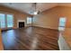 Living room featuring a fireplace and patio access at 3878 Hannahberry Pl, Buford, GA 30519