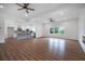 Spacious living room with hardwood floors and a connected kitchen at 1993 Reynolds Sw Dr, Atlanta, GA 30315