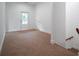 Room with stairs and plenty of natural light at 1993 Reynolds Sw Dr, Atlanta, GA 30315