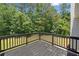 Enjoy the outdoors on this stained wooden deck offering green views at 3156 Ozmer Lndg, Decatur, GA 30034