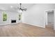 Cozy living room features a decorative fireplace, large windows, and modern lighting, creating a relaxing atmosphere at 3156 Ozmer Lndg, Decatur, GA 30034