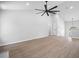 Spacious living room showcasing high ceilings and modern ceiling fan at 3156 Ozmer Lndg, Decatur, GA 30034
