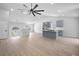 Bright and airy living space with hardwood floors, an island kitchen, and modern fixtures at 3156 Ozmer Lndg, Decatur, GA 30034