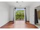 Bedroom showcasing balcony with view and ensuite bathroom at 400 17Th Nw St # 1321, Atlanta, GA 30363