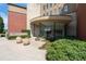 Inviting building entrance featuring manicured landscaping and modern architectural elements at 400 17Th Nw St # 1321, Atlanta, GA 30363