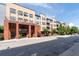 Apartment building exterior with brick facade, multiple balconies, and street view at 400 17Th Nw St # 1321, Atlanta, GA 30363