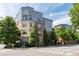 Multi-story building exterior showcasing a modern architectural design with a mix of colors and materials at 400 17Th Nw St # 1321, Atlanta, GA 30363