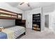 Bedroom with a bunk bed, bookshelf, and neutral decor at 510 Cunninghame Ct, Peachtree City, GA 30269