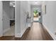 Bright entryway with hardwood floors and white trim, leading to the rest of the home's living spaces at 510 Cunninghame Ct, Peachtree City, GA 30269
