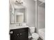 Cozy bathroom featuring a shower-tub combo, a modern vanity, and an ample mirror at 752 Winton Way, Atlanta, GA 30312